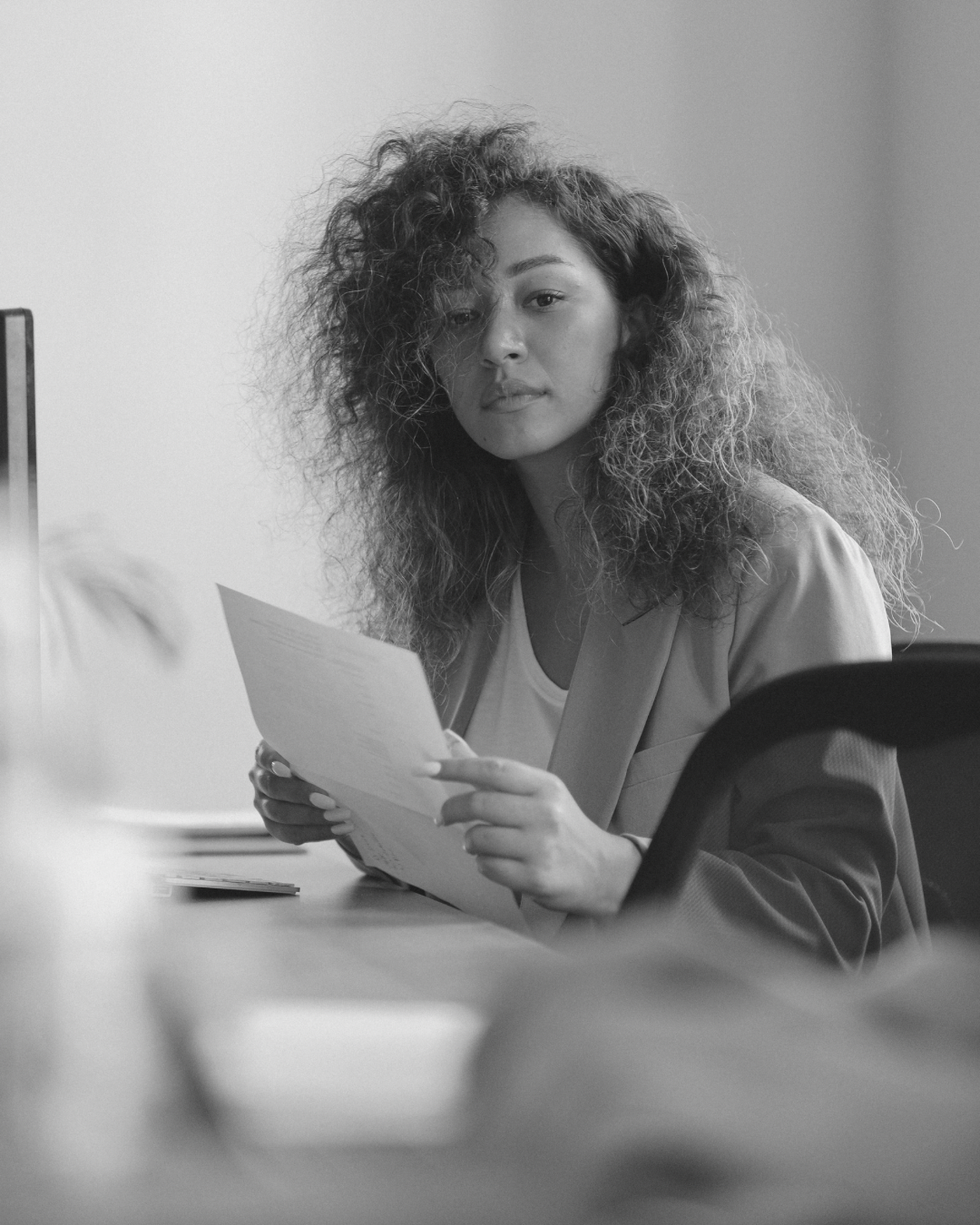 A practitioner reviewing work, focused and present